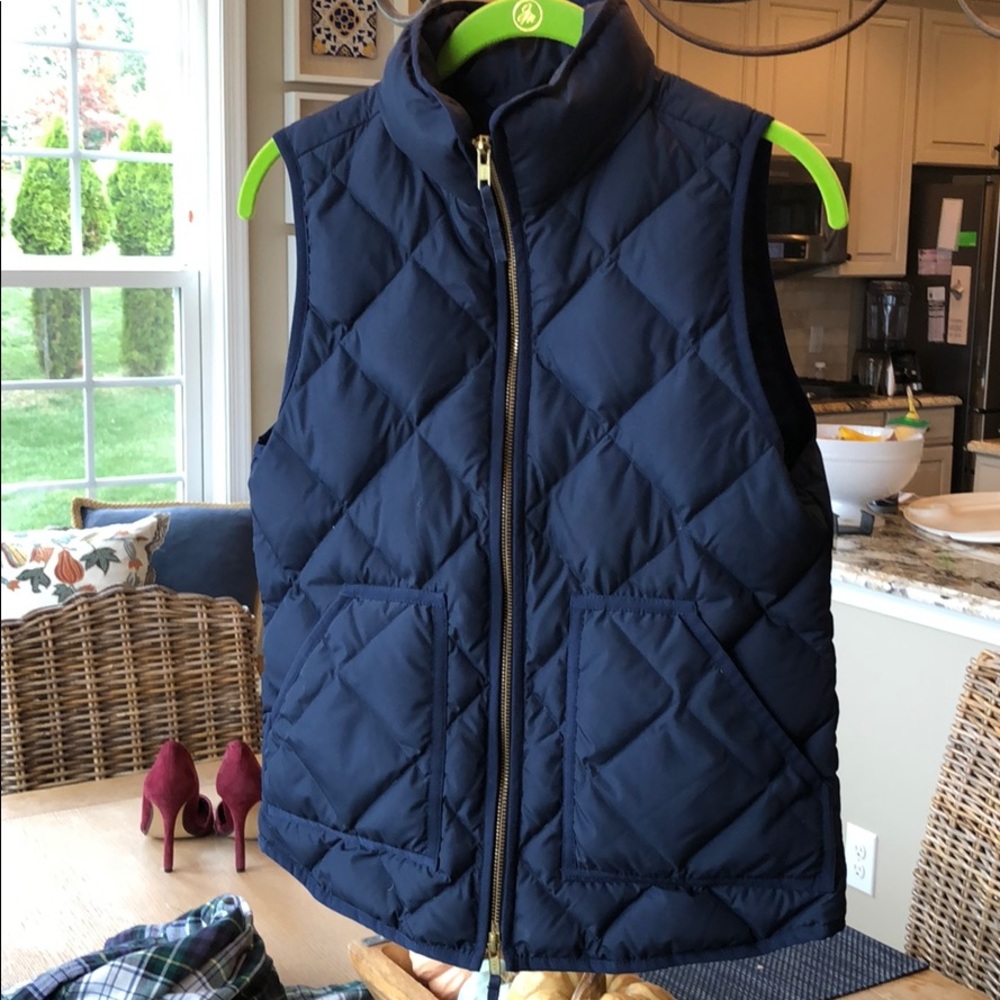 Navy blue quilted puff vest